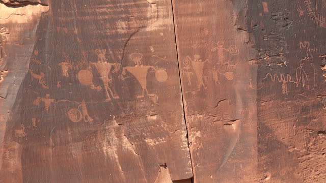 Fremont petroglyphs high on cliff face Moab Utah