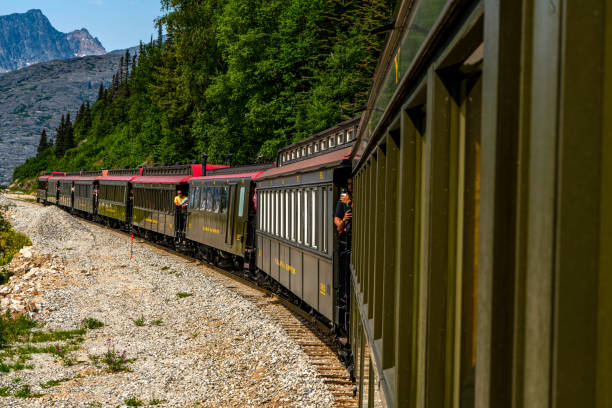 istock White Pass Summit excursion tour train in the mountains, Alaska, USA. 1765435423