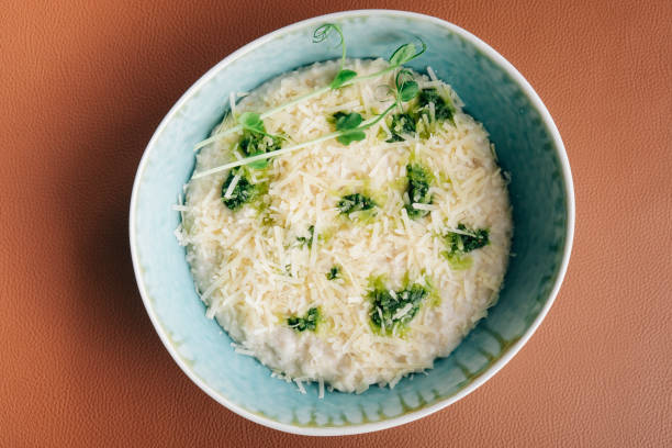 istock A bowl of oatmeal sprinkled with Parmesan cheese 1765462821