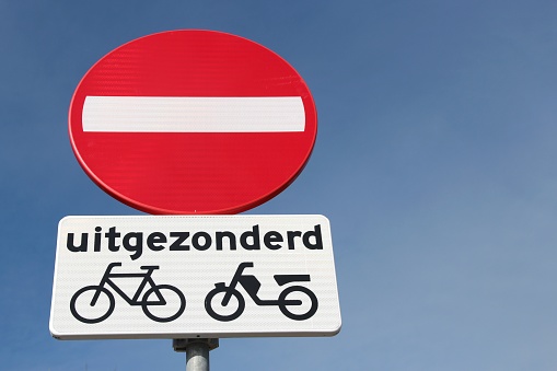 Dutch road sign: no entry, except pedal cycle and mopeds