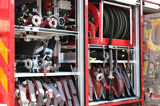 fire hoses on board a fire engine