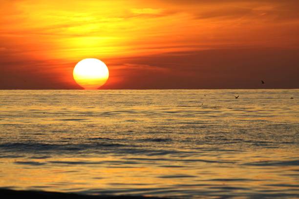 istock sun sinking into the sea 1765471545