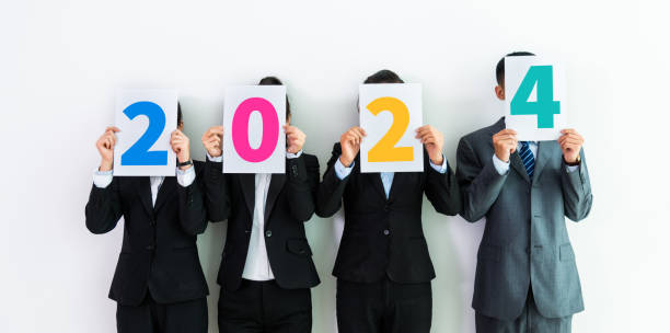 istock Business team holding number 2024 1765474670