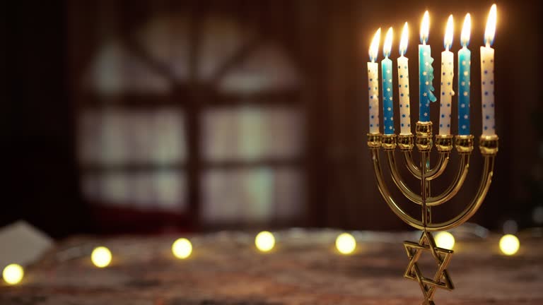 Hanukkah candlestick with lights background