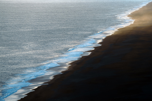 Aerial shoot of the wave at the North Atlantic Ocean, Black Sand Beach