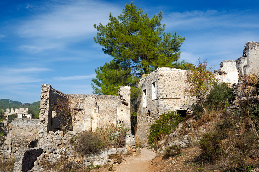 Ölüdeniz is located in Fethiye district of Muğla province in Turkey. Kaya village, the abandoned village in Ölüdeniz.