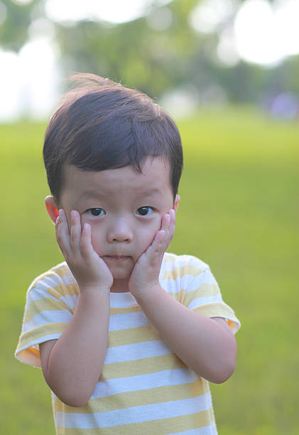 istock Cute children playing in the park 176553736