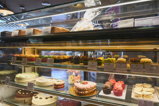 istock Colorful cakes and sweets in a pastry display case. 1765541327