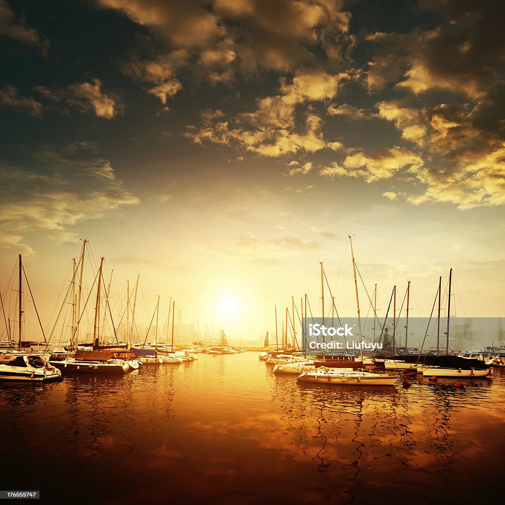 Yachts and marina Yachts and pier at dusk Hong Kong Stock Photo