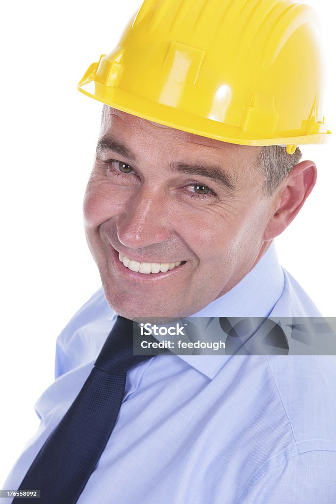 Vecchio ingegnere sorriso per la macchina fotografica - Foto stock royalty-free di Abbigliamento formale