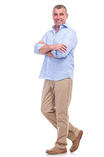 istock casual middle aged man with arms crossed 176558821