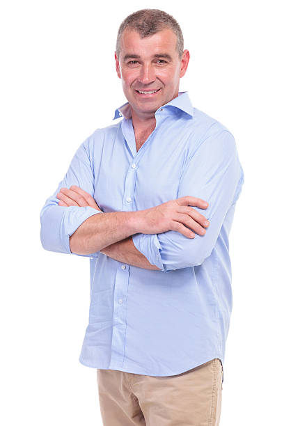 istock casual middle aged man has his arms crossed 176558910