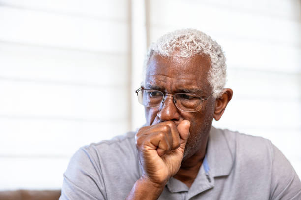 istock Senior black man coughing 1765602060