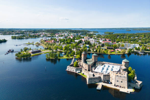 Savonlinna city in Finland with its iconic castle landmark seen from the air on a beautiful summer day Savonlinna, Finland - June 6, 2023: Savonlinna city in Finland with its iconic castle landmark seen from the air on a beautiful summer day etela savo finland stock pictures, royalty-free photos & images