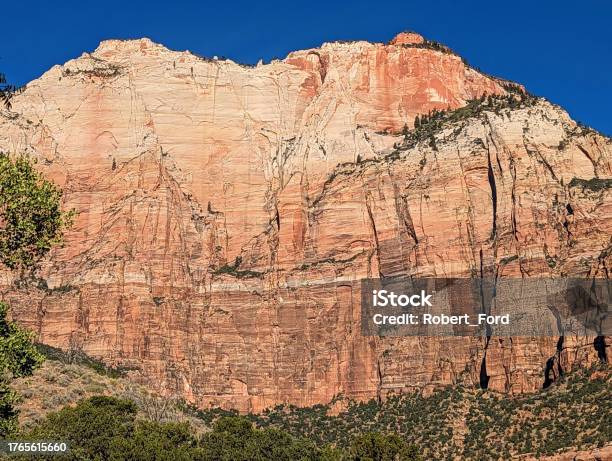 Sandstone Cliffs Of Zion Canyon At The Community Center And Public Library In Springdale Utah With Backdrop Of Zion National Park Stock Photo - Download Image Now