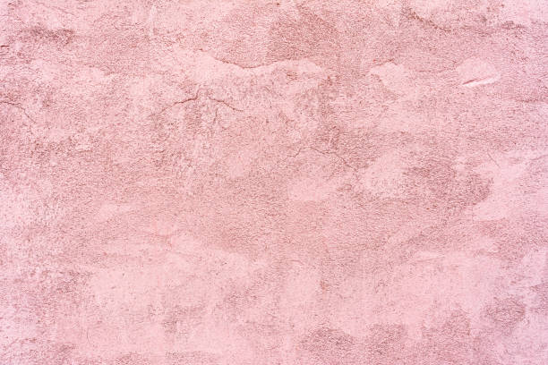istock Relief texture of pink plaster with small cracks. Abstract background 1765617922