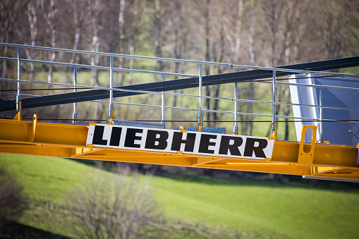 Semmering, Austria - April 22, 2023: Logo of german crane company Liebherr on a tower crane