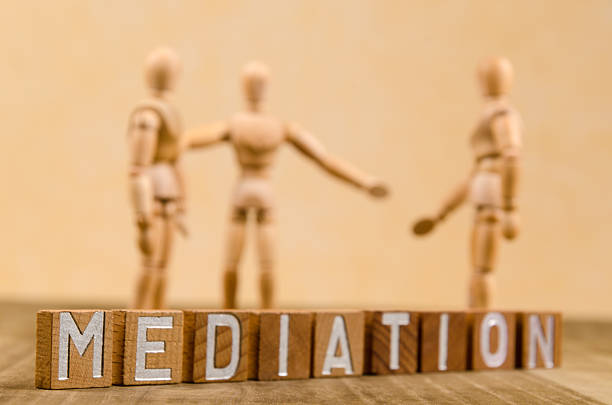 wooden mannequin in front of yellow and wooden colors at mediation. Strong shallow DOF on first letter. More versions available.
