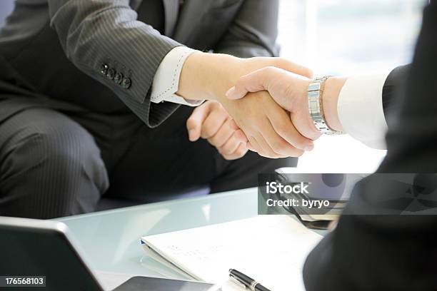 Businessmen Shaking Hands Stock Photo - Download Image Now - Board Room, Obscured Face, Adult