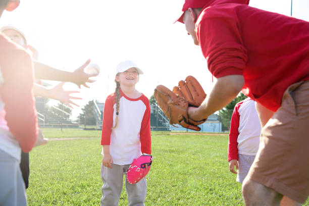 istock On the baseball field, a coach engages in conversation with his players. 1765702255