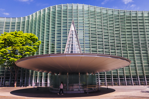 Tokyo, Japan - April 08, 2023: National Art Center in Roppongi, Minato. The modern building has been designed by Kisho Kurokawa. It is one of the largest exhibition spaces in the country