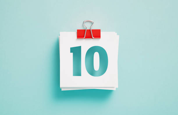 istock Number 10 Written Post It Notes Held By A Paper Clip On Blue Background 1765726338