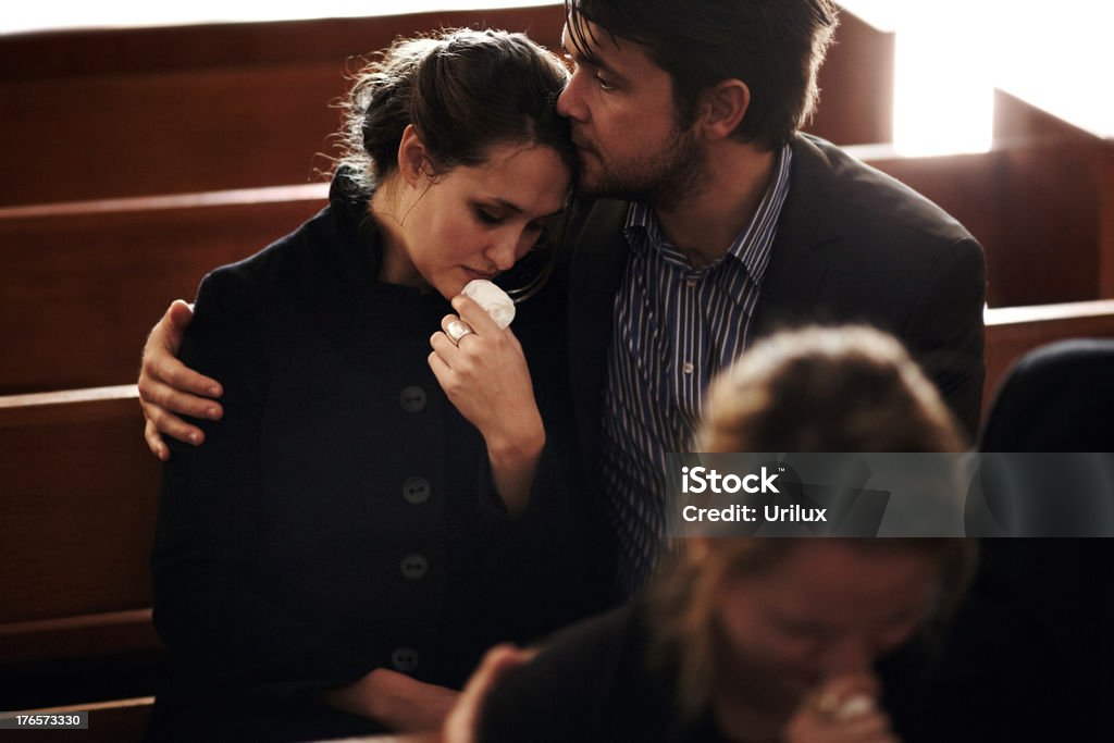 Filled with sorrow at their loss  Funeral Stock Photo