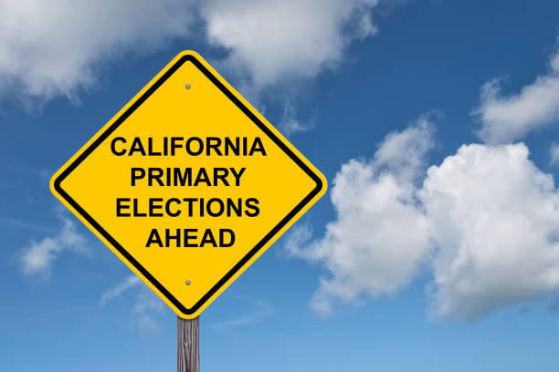 istock California Primary Elections Ahead Caution Sign Blue Sky Background 1765733425