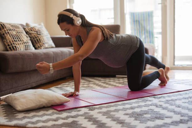 istock Pregnant woman doing core exercises 1765759495