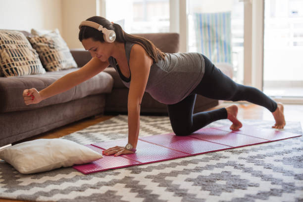 istock Pregnant woman doing core exercises 1765759496