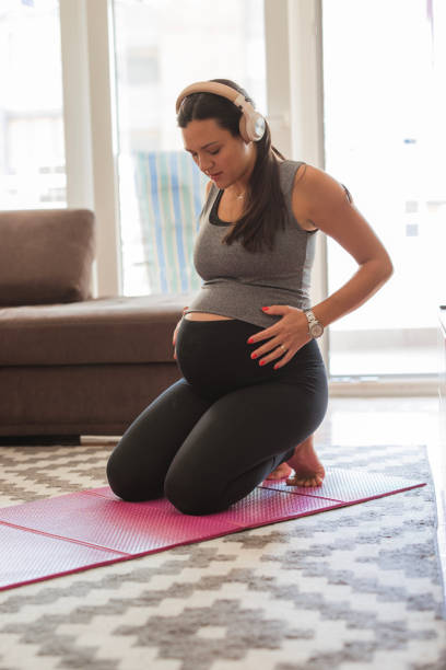istock Fit pregnant woman taking a break during exercise 1765759502