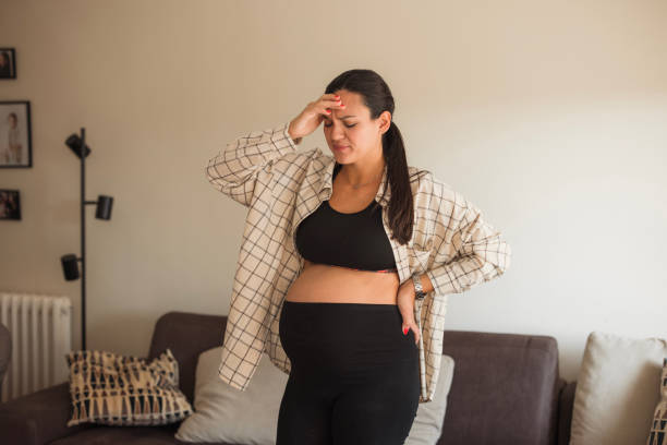 istock Pregnant woman with a headache 1765760015