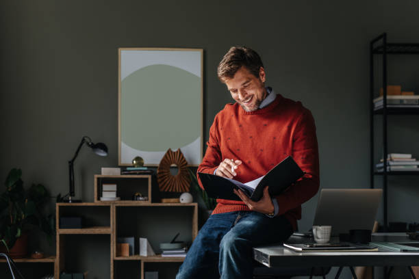 istock A Happy Handsome Businessman Working In The Office 1765761254
