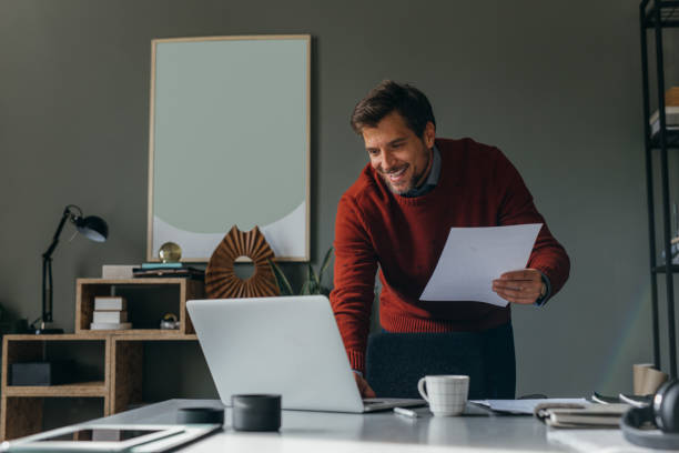 istock A Happy Handsome Businessman Working On His Computer In The Office 1765761787