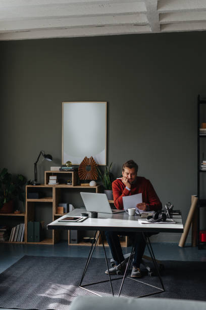 istock A Handsome Businessman Sitting In His Office And Working 1765761840