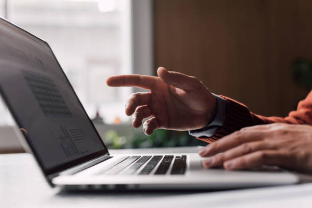istock A Cropped Photo Of An Unrecognizable Businessman Using His Computer While Sitting In The Office 1765761852