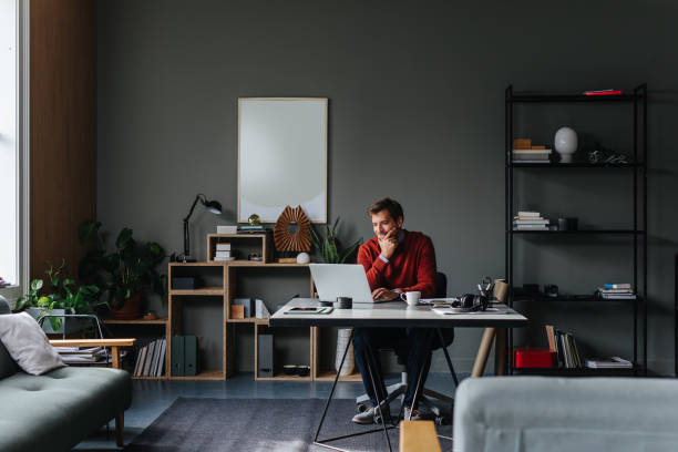 istock A Happy Handsome Businessman Working On His Computer In The Office 1765762378