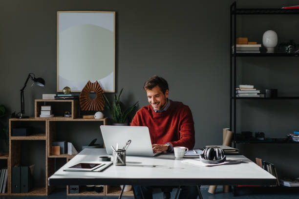 istock A Happy Handsome Businessman Working On His Computer In The Office 1765762406