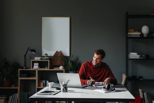 istock A Happy Handsome Businessman Working On His Computer In The Office 1765762410