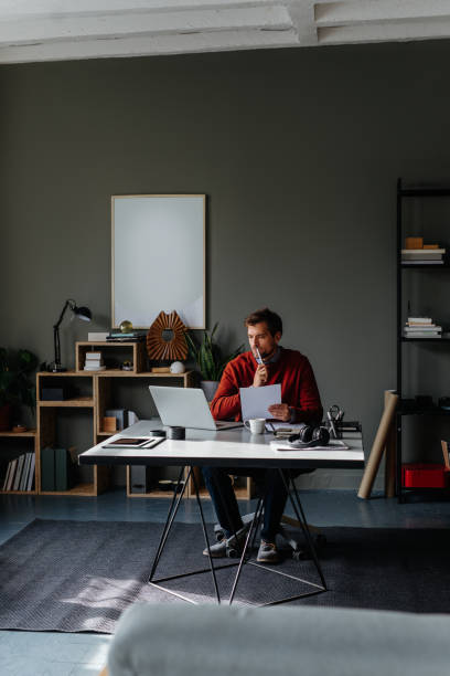 istock A Handsome Businessman Reading Something On His Computer While Sitting In His Office And Working 1765762419