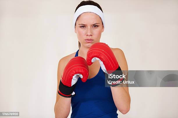 Taking Her Workout Seriously Stock Photo - Download Image Now - Beautiful People, Boxing - Sport, Boxing Glove