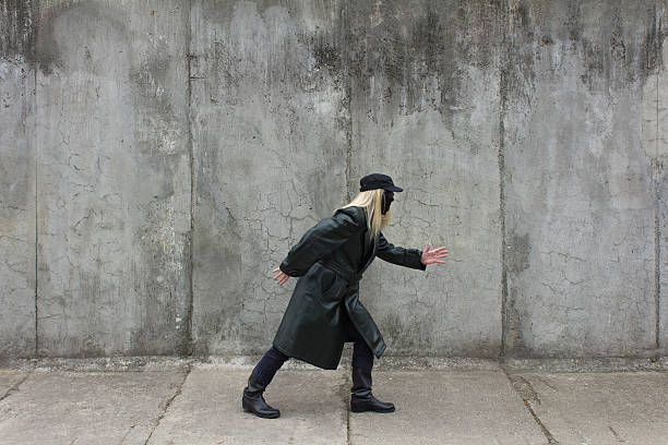 istock creeping Blonde masked woman 176578732
