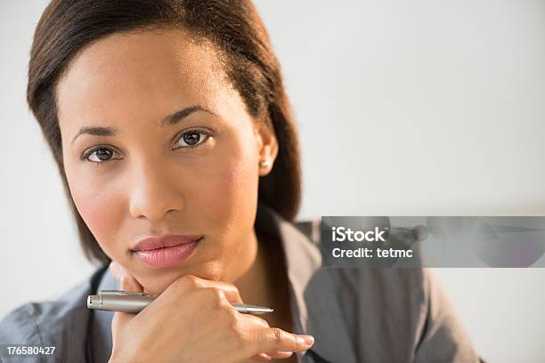 Closeup Portrait Of Thoughtful Businesswoman Stock Photo - Download Image Now - 20-29 Years, 25-29 Years, Adult
