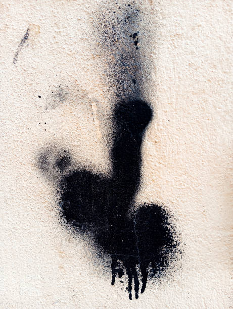istock Weathered dirty cement wall with black paint. Abstact black paint grunge background. 1765810715