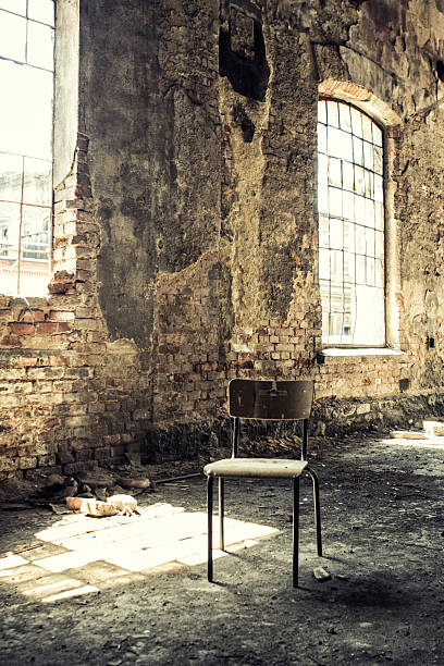 istock Old Chair Standing in Abandoned Building 176581168