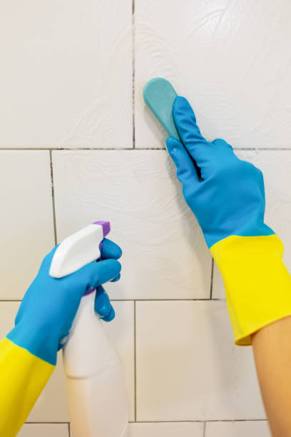 istock Woman cleaning the bathroom 1765859502