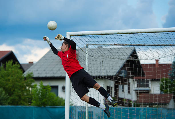 istock Soccer goalie defending in mid-air 176586625