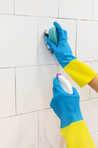 istock Woman cleaning the bathroom 1765878050