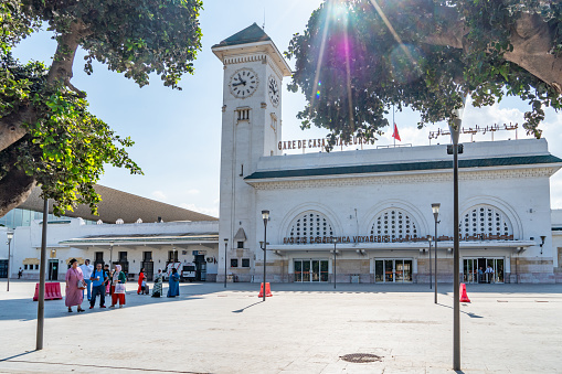 Casablanca, Morocco - Sep. 12 2023: Casa-Voyageurs railway station (Arabic: محطة الدار البيضاء المسافرين‎) is an ONCF station in the city centre. The station is served by suburban and long-distance trains. Morocco flags flown at half-mast to mourn earthquake victims.