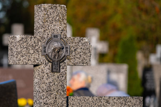 istock Stone cross in the cemetery 1765912259